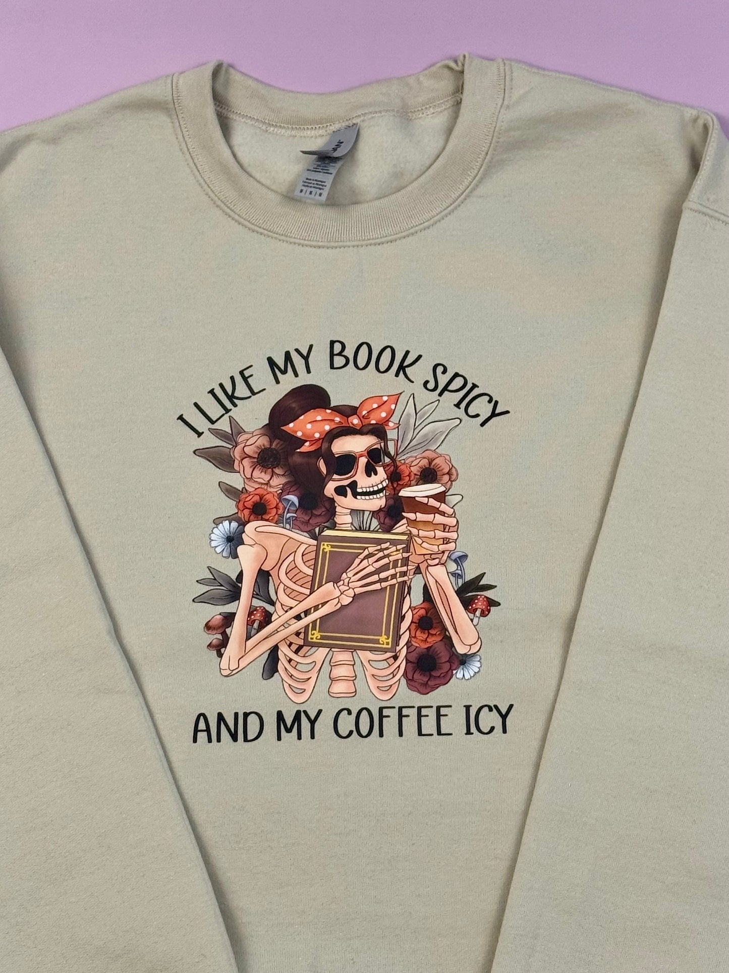 “I Like My Book Spicy And My Coffee Icy” Size Medium Sand Crewneck Sweater